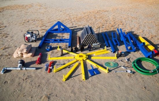 Village Drill components displayed on the ground